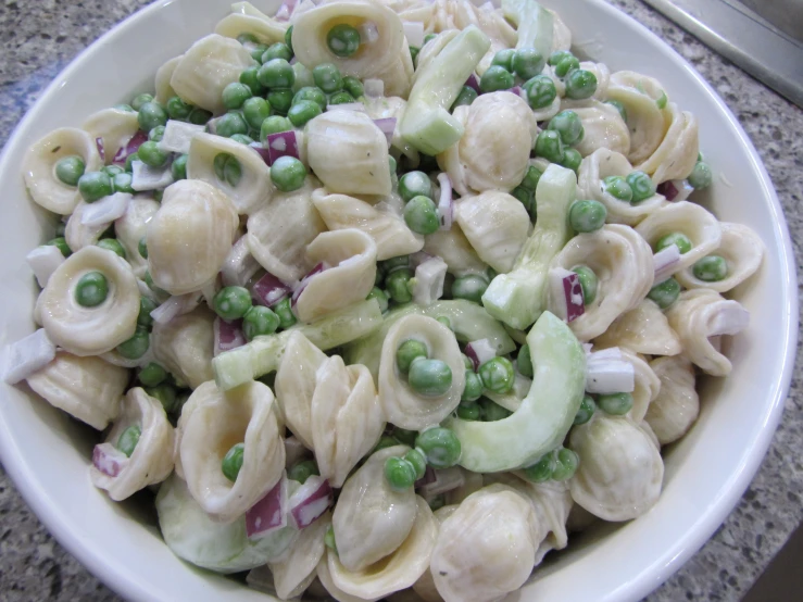 a close up of a bowl of food on a table