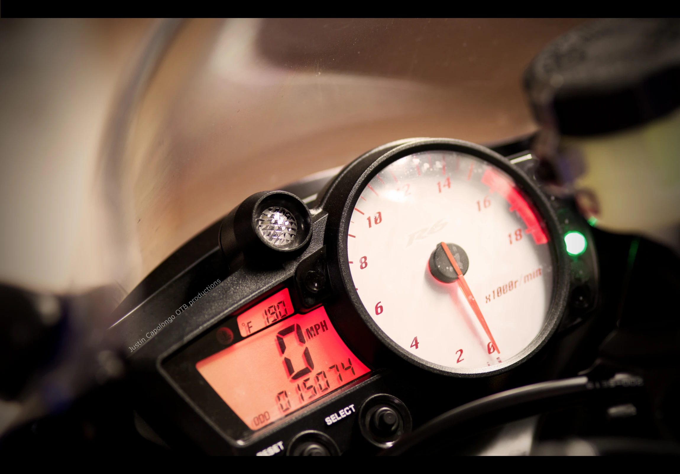 a meter sits on the back of a motorcycle