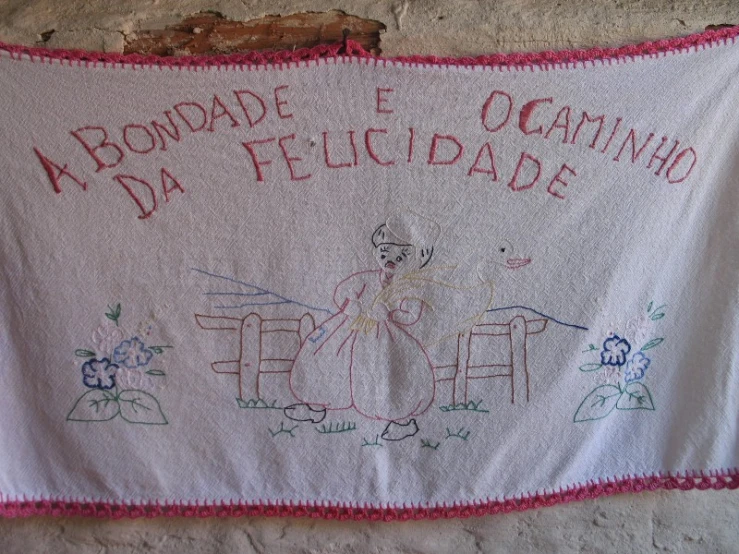 a cloth banner that says above it, above a drawing