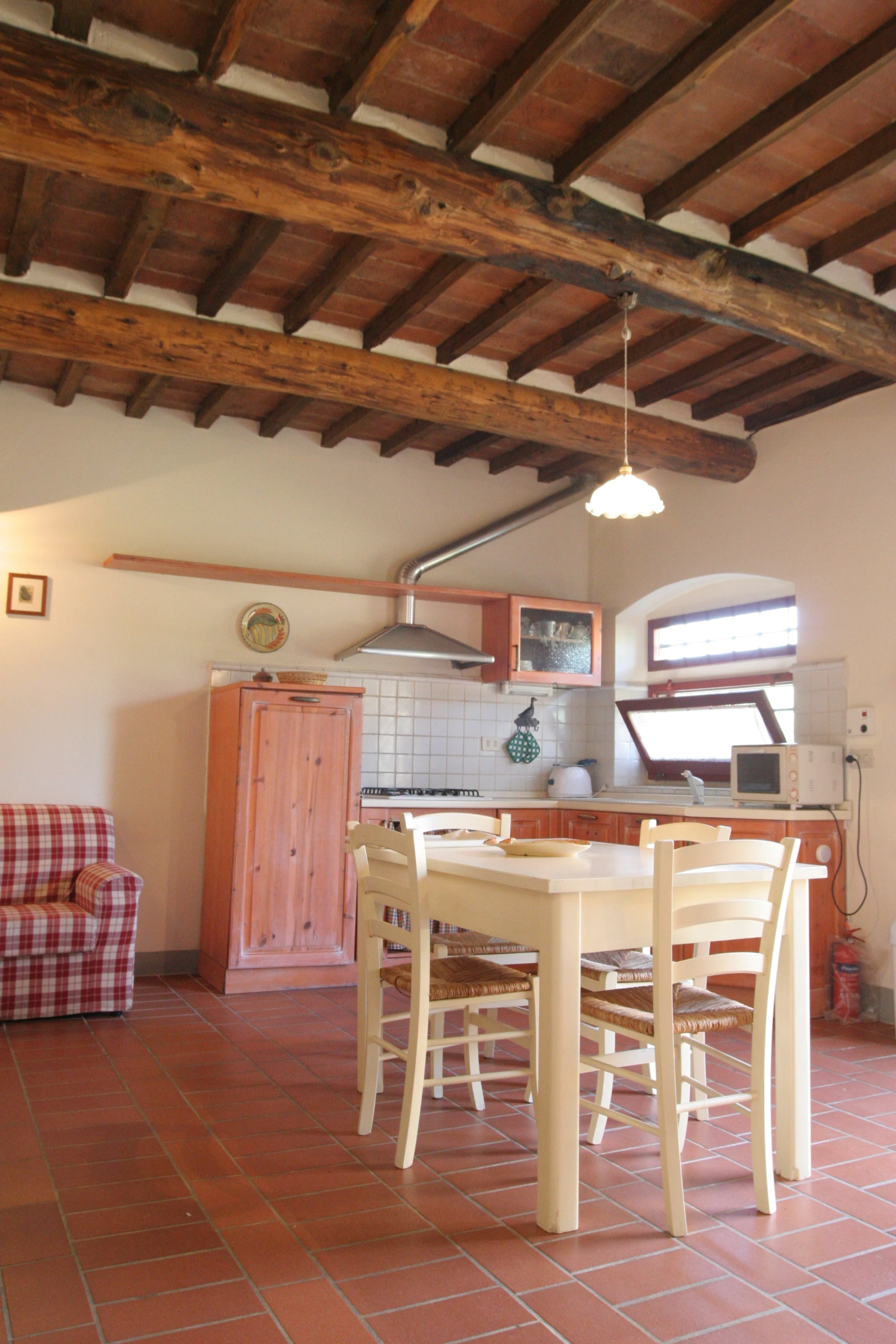 a large open kitchen and dining room area in a home