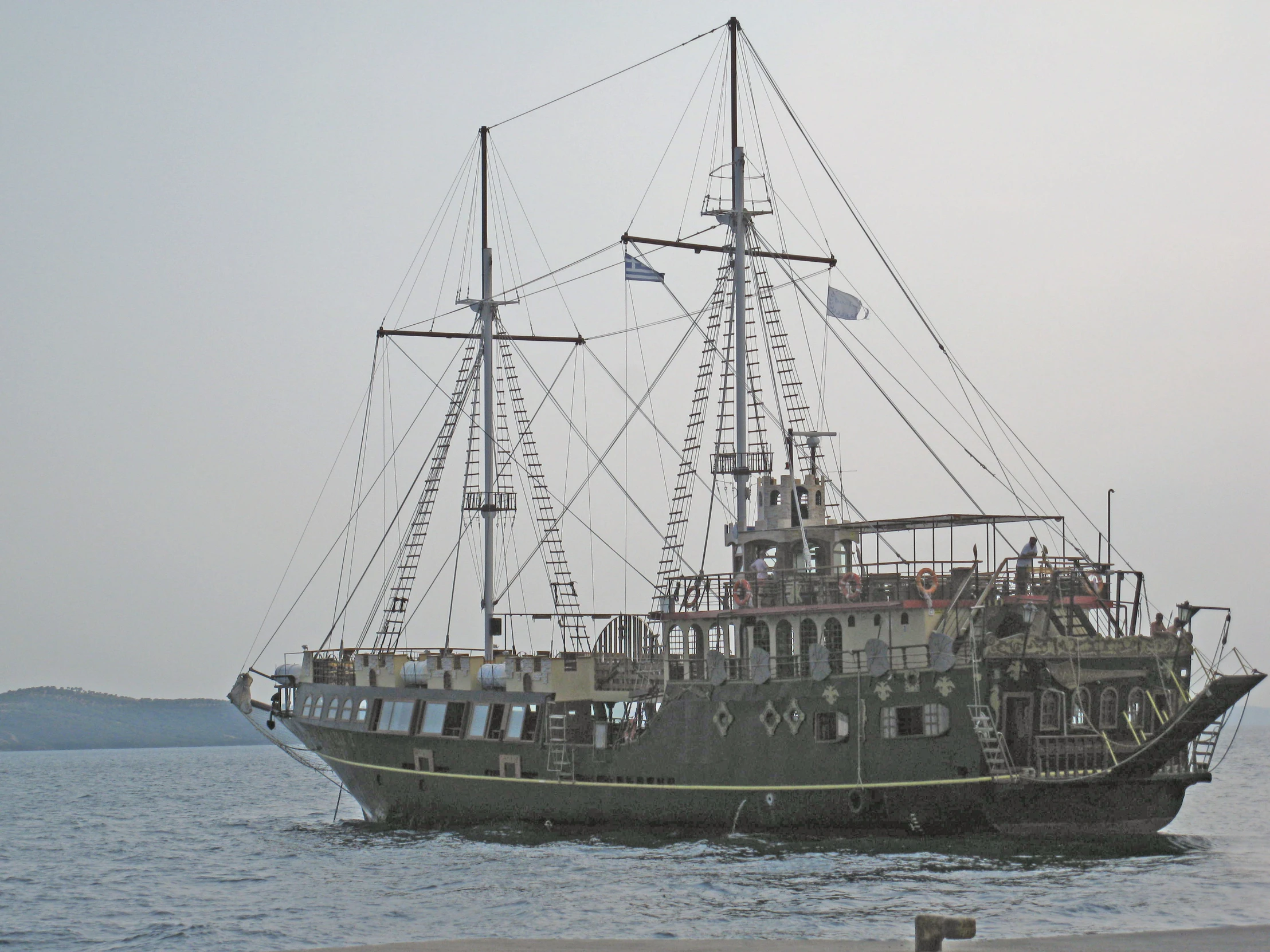 an old pirate boat that is in the ocean