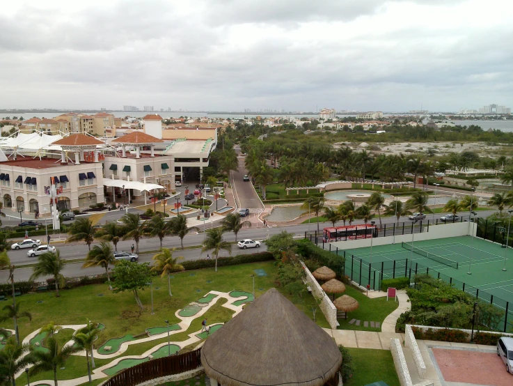 a small village is located near some tall buildings