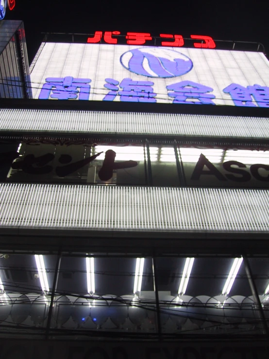 people walk around the outside of a building