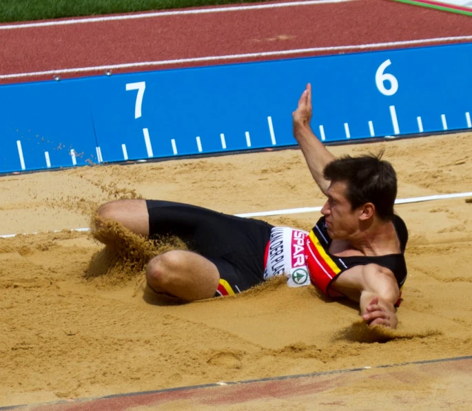 the athlete falls to the ground while winning a race