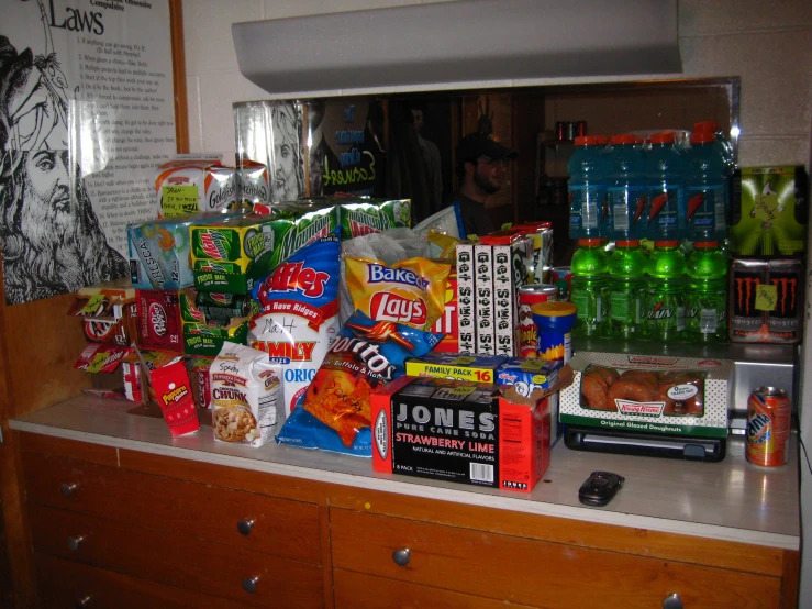 a counter top that has various snacks on it