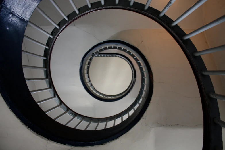 there is a spiral staircase in a building