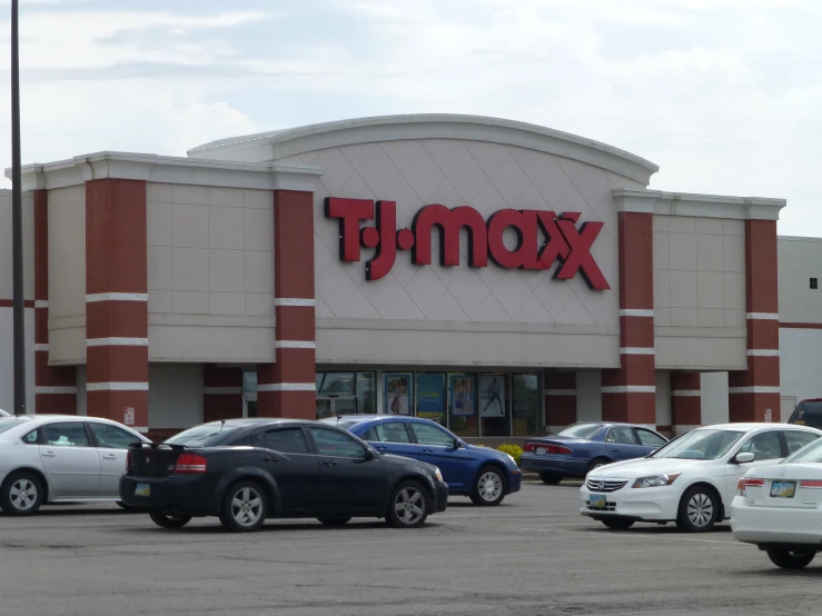 cars are parked outside of a store called f n mox