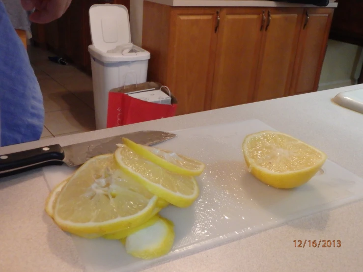 a couple of lemons that are on a  board
