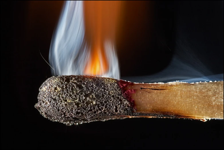 a piece of bread that has fire coming out of it