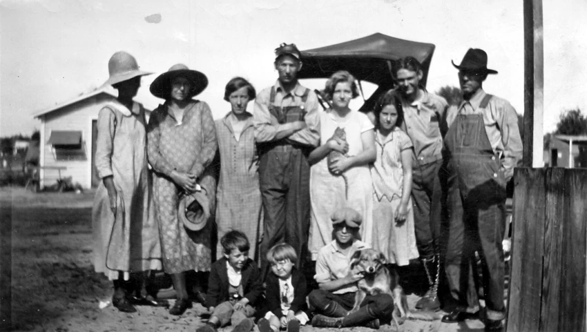 group of women in dresses posing in the sun