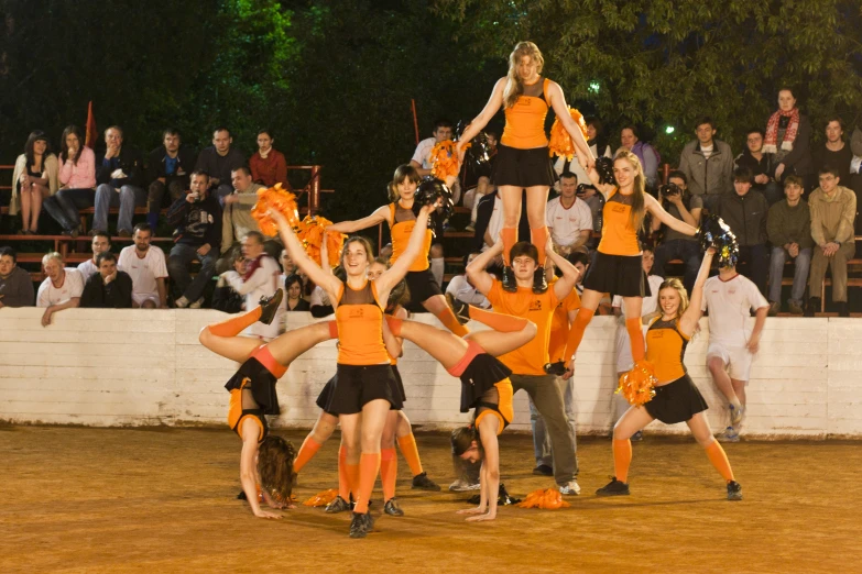 young women in sports wear dancing at an event