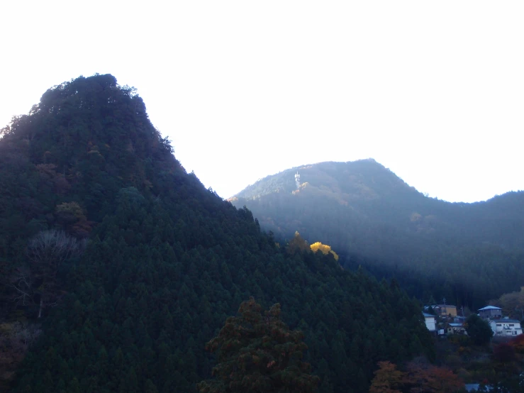 some very big mountains in the middle of some buildings