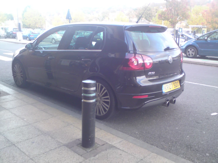 a car is parked on the side of the road