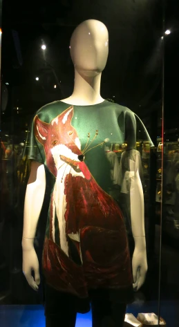 a woman's dress made of leather with fox print