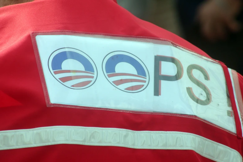 the obama dnc logo is on a red shirt