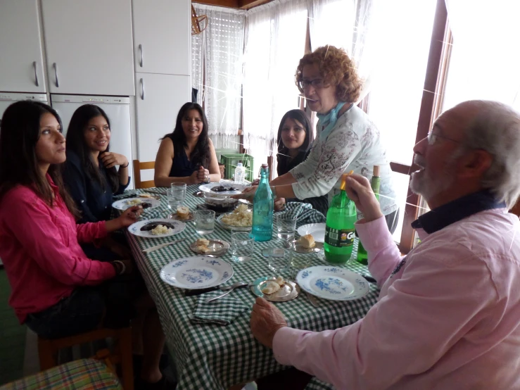 there are five women that are sitting at a table