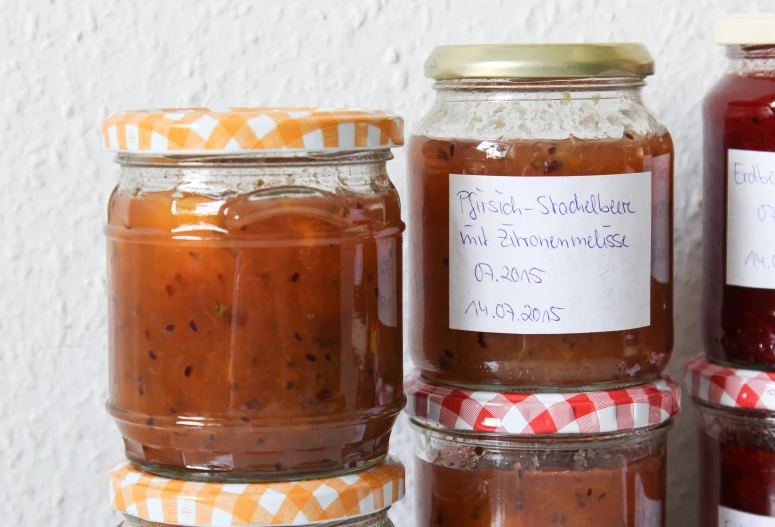 jars full of preserves sitting side by side