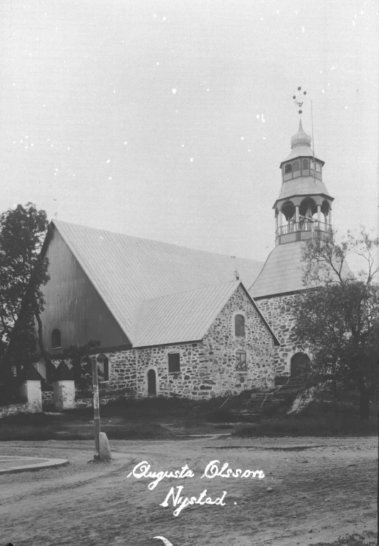 a old church with its steeple standing tall