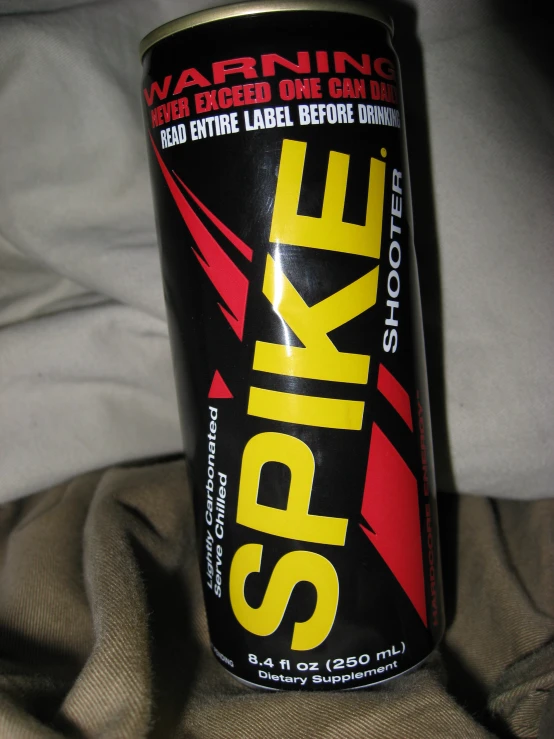 a can of spike is shown on a brown jacket