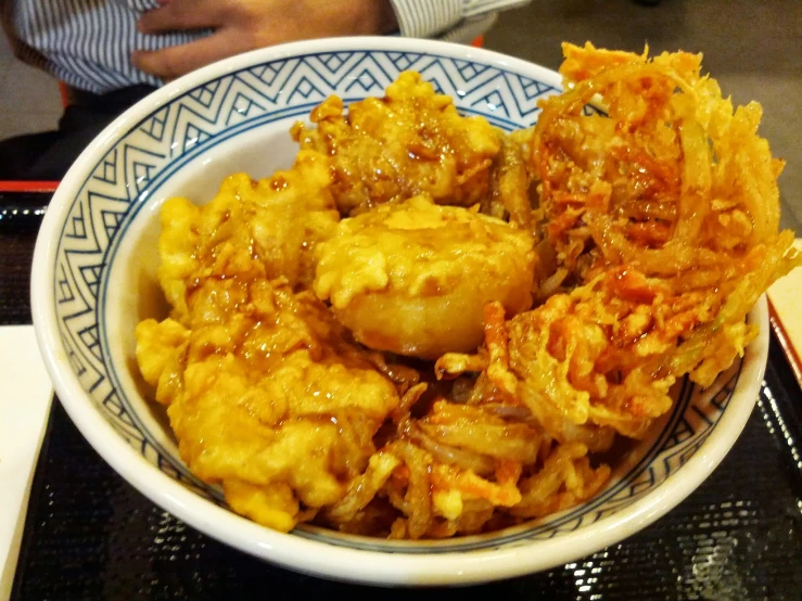 there are bowls full of different types of food