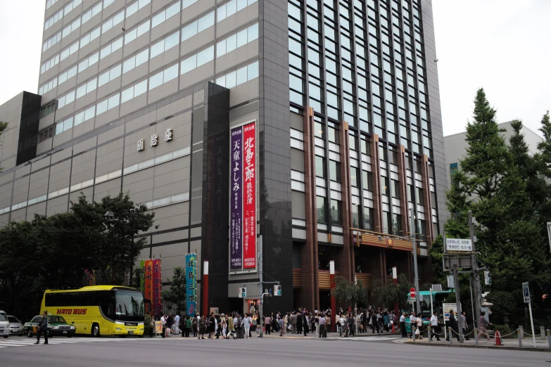 a group of people stand outside a building