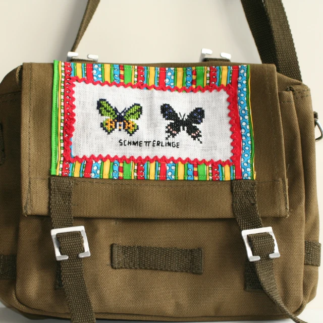 an image of a bag with cross stitching