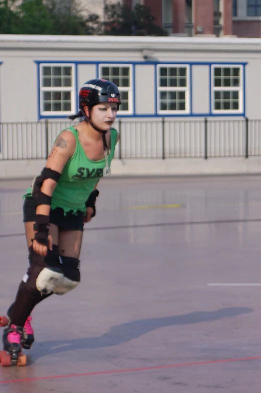a person wearing body paint riding on a skateboard