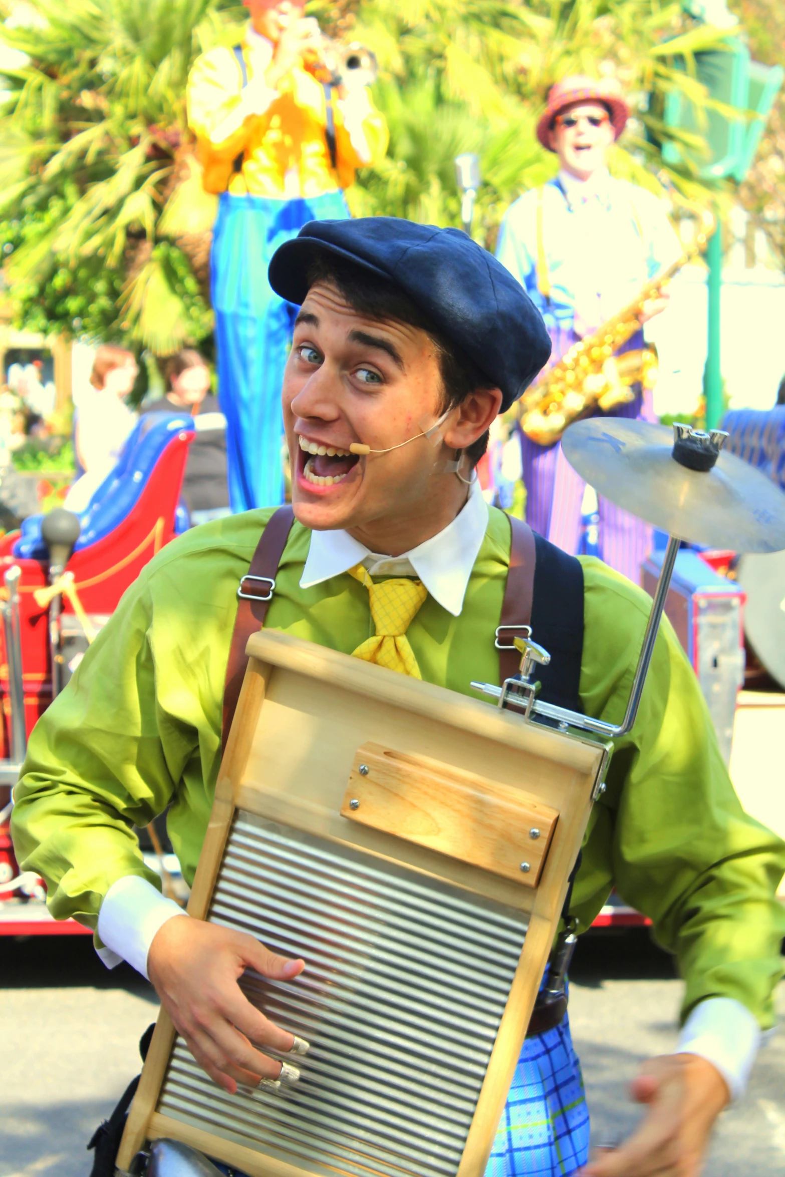 a man in a green shirt with a briefcase and hat