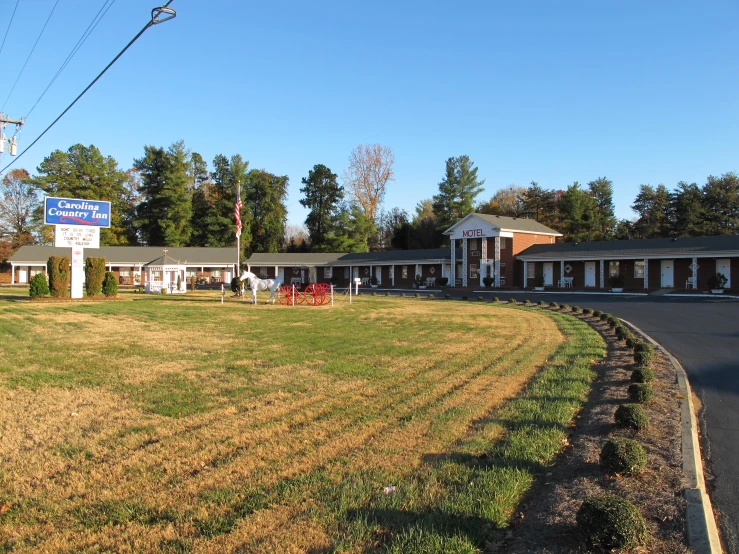 the motel in the middle of the yard is empty