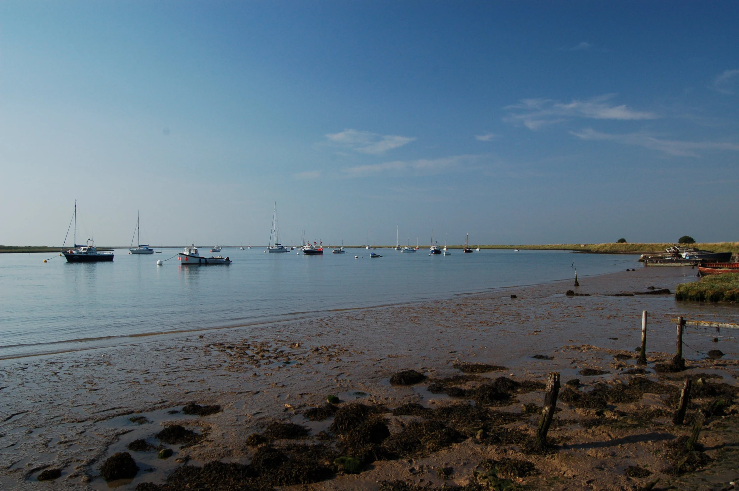 a body of water with boats floating in it