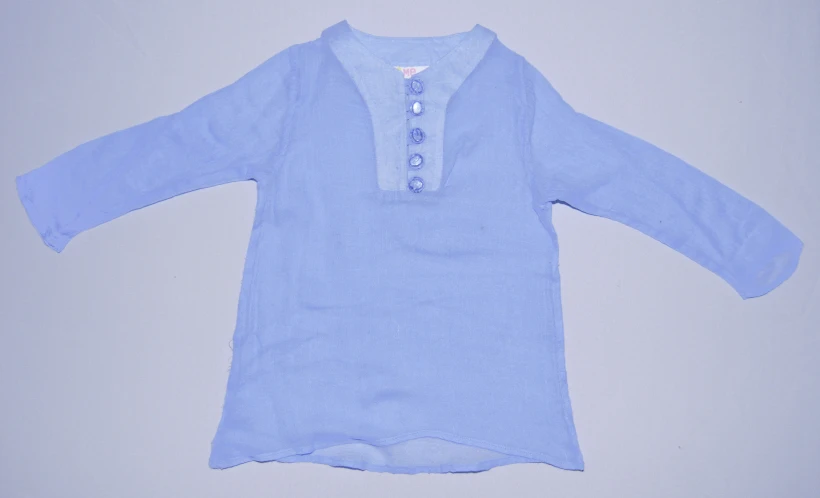 there is a baby shirt that has some ons on it