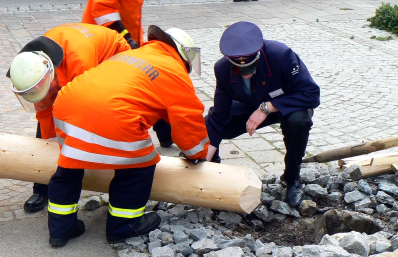 people are doing soing on a piece of wood