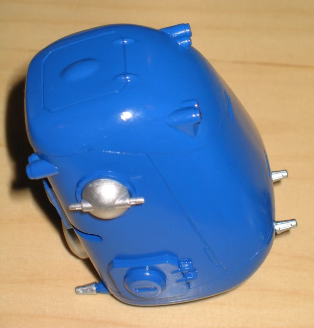 a blue toy car with two pieces missing