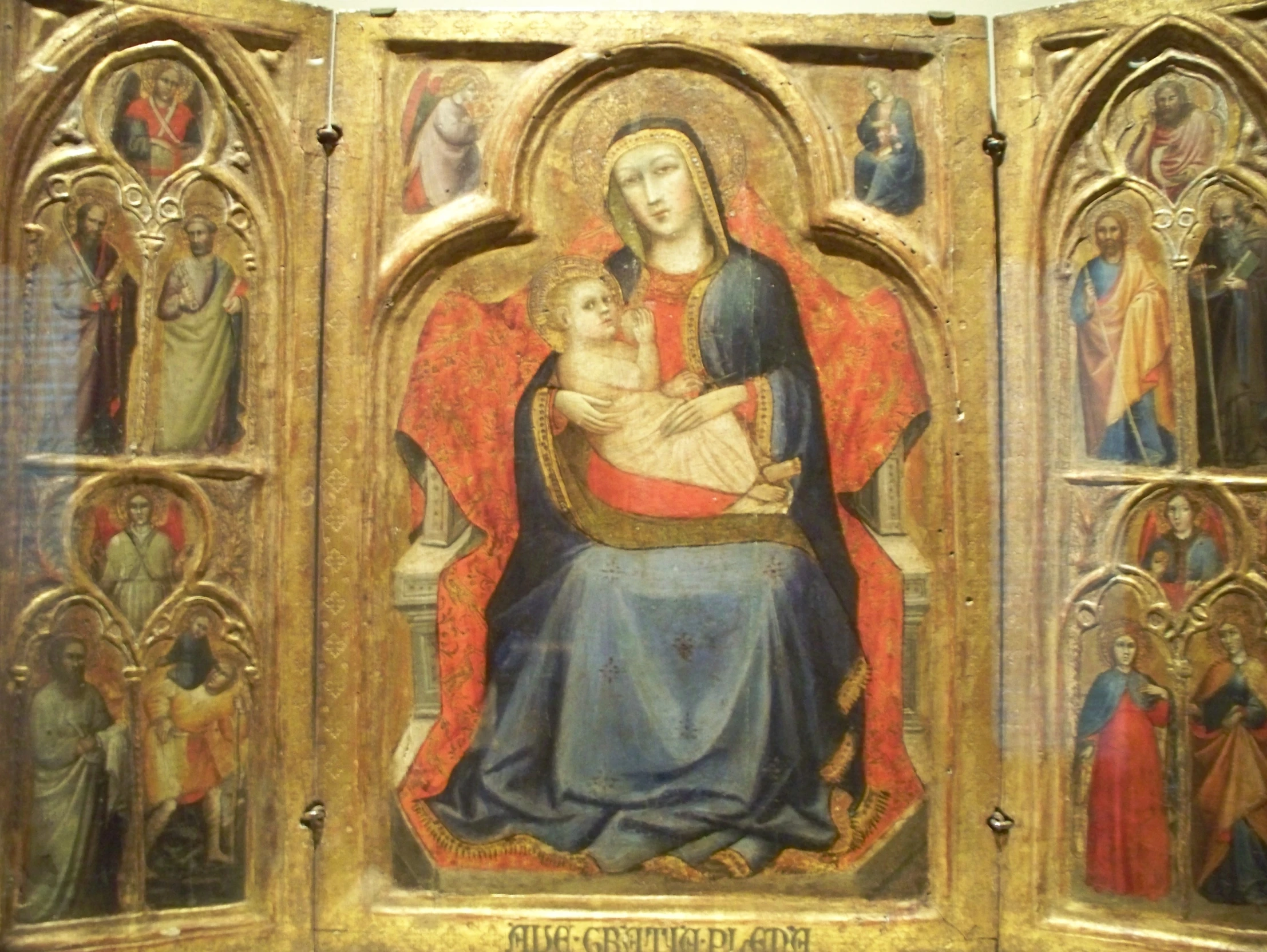 a painting of mary and jesus holding the child jesus