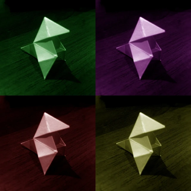 a group of six origami style designs of stars and triangles