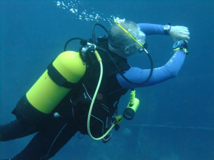 a person in the water wearing a diving mask