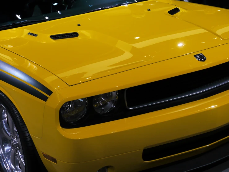 a close up view of the front of a sports car