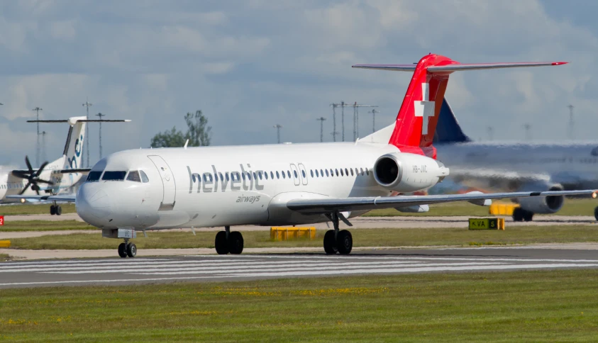 a jet is on the runway of an airport