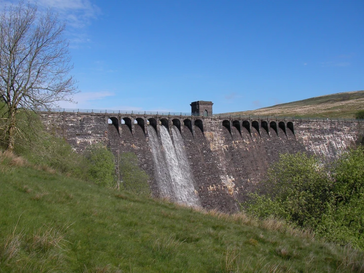 a waterfall that has been built into the side of a cliff