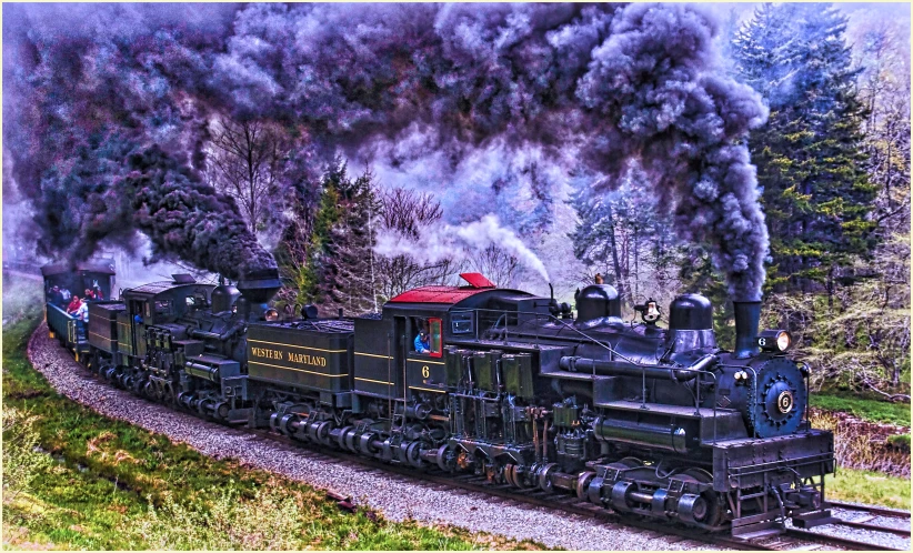 an old steam locomotive pulling several cars through a field