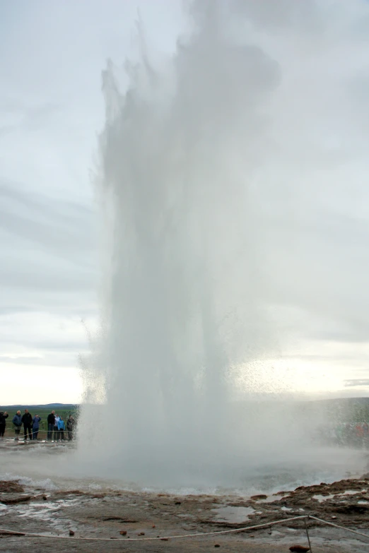 a geyser that is blowing water in a pool