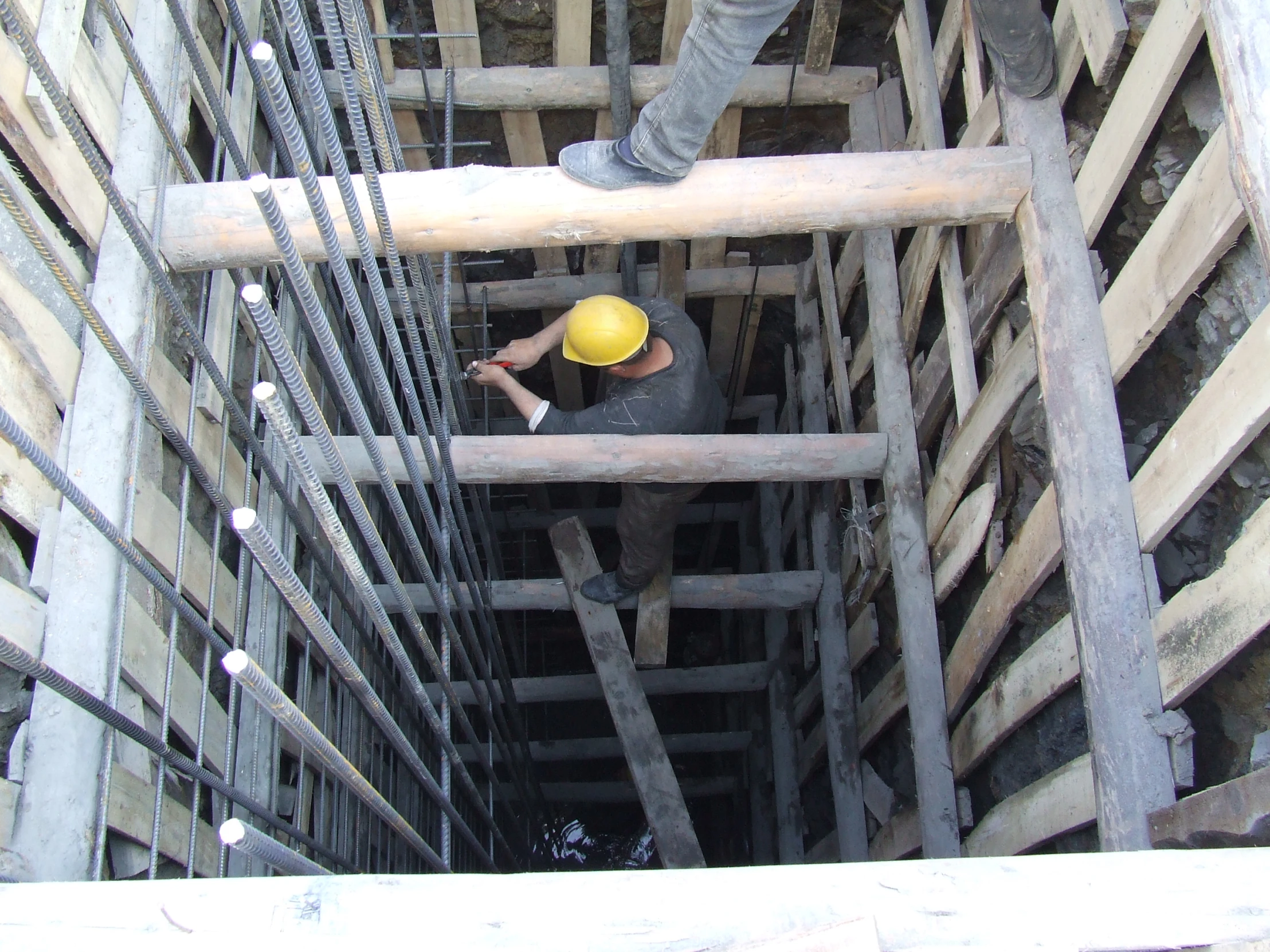 a man working on a large construction structure