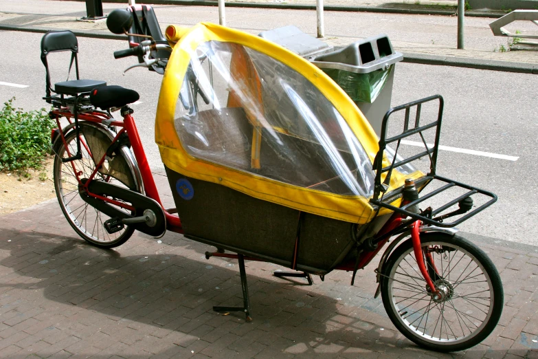 the bike has a trailer attached to the back