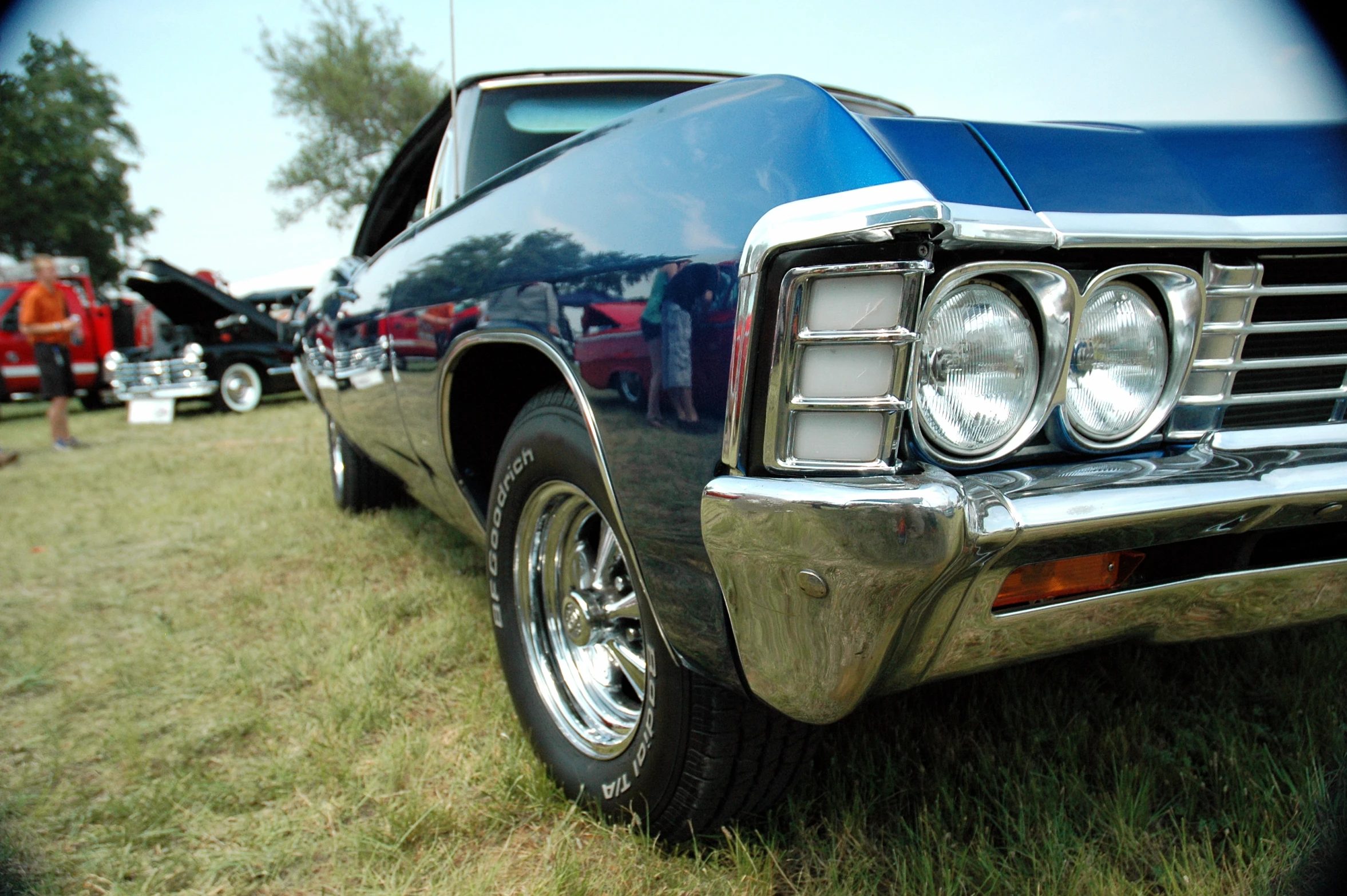 a close up view of a classic car on display