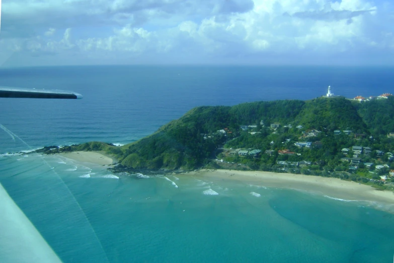 there are an island with a sandy beach next to the water