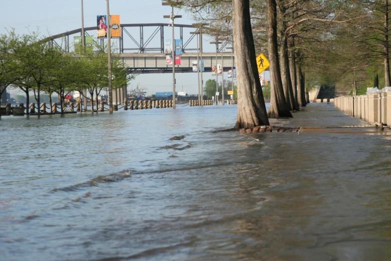 a road that has been flooded in by a river