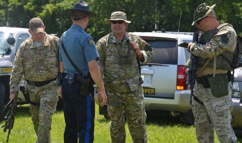 an image of military men talking together