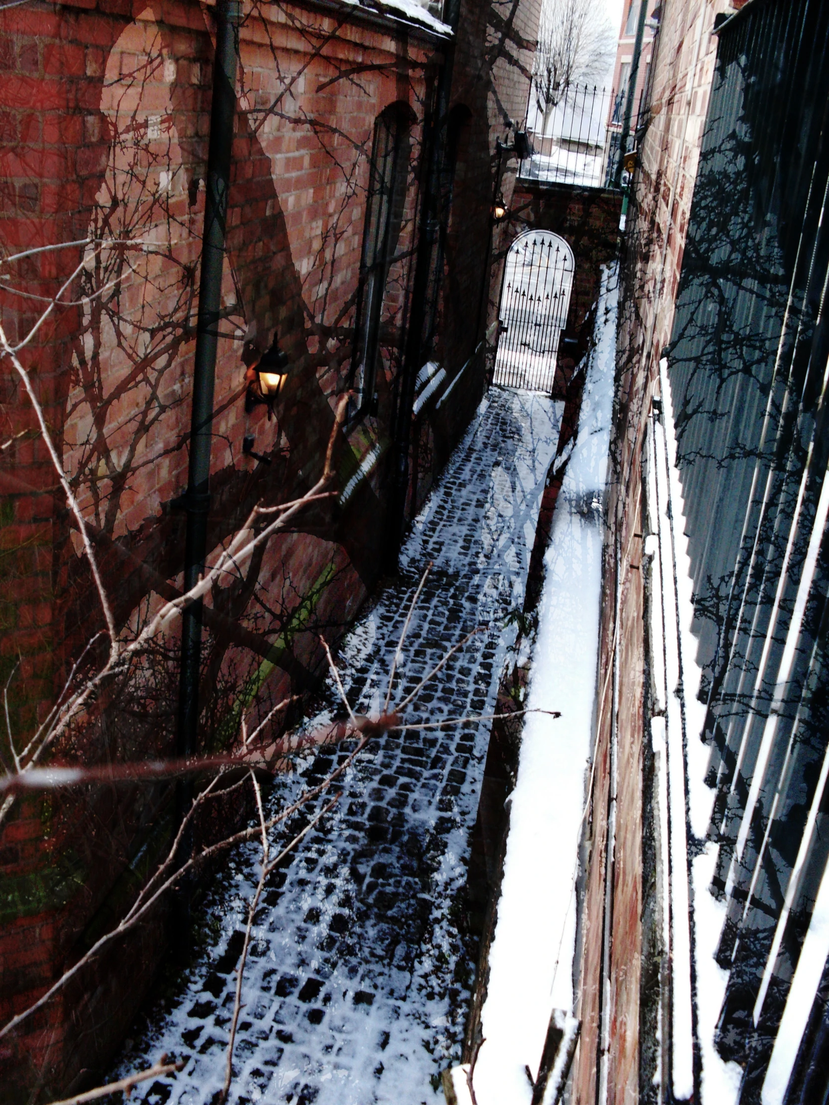 a red brick building with snow around it