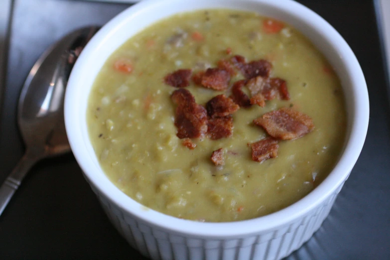 a close up of a bowl of food on a table