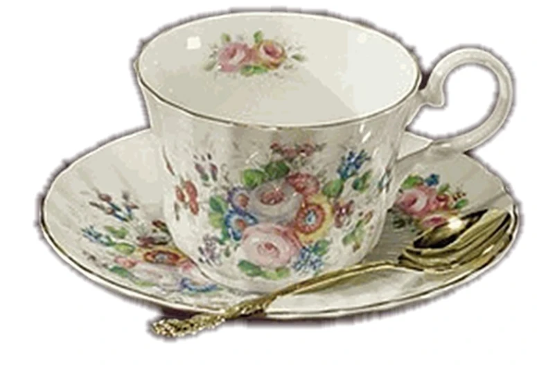 a white coffee cup with floral designs on it
